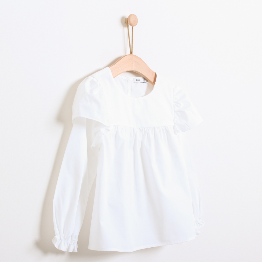 Blusa con volante en las mangas