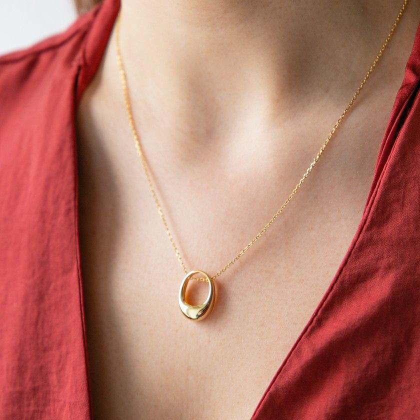 Golden silver necklace with oval pendant