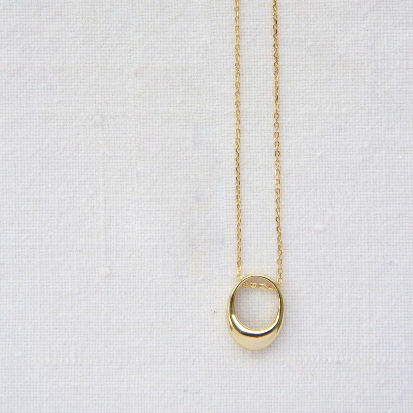 Golden silver necklace with oval pendant