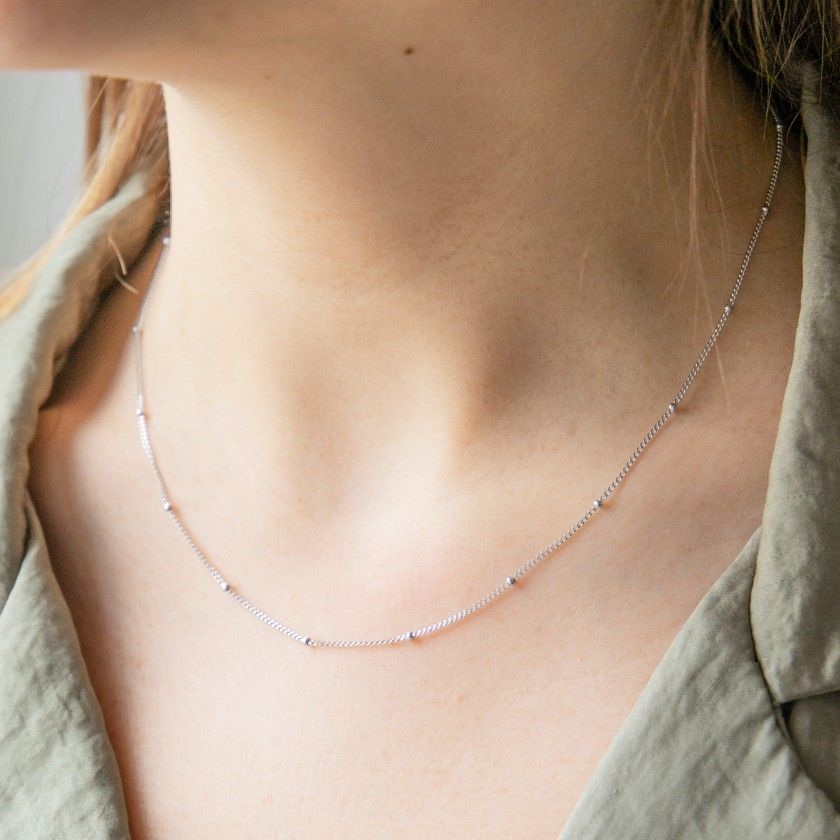 Silver necklace twisted