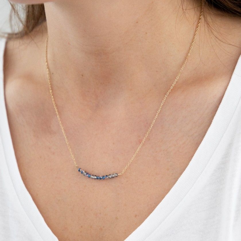 Golden stainless steel necklace with blue beads