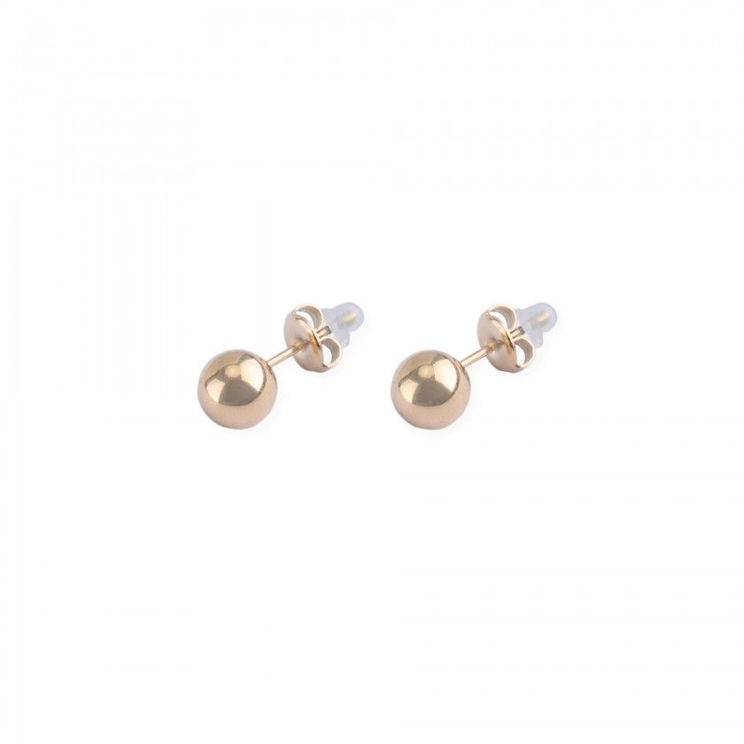 Golden earrings with large stainless steel ball