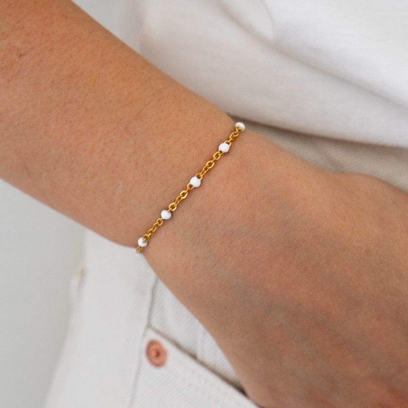 Bracelet with white stones in golden stainless steel