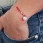 Pulseira missangas e pompom